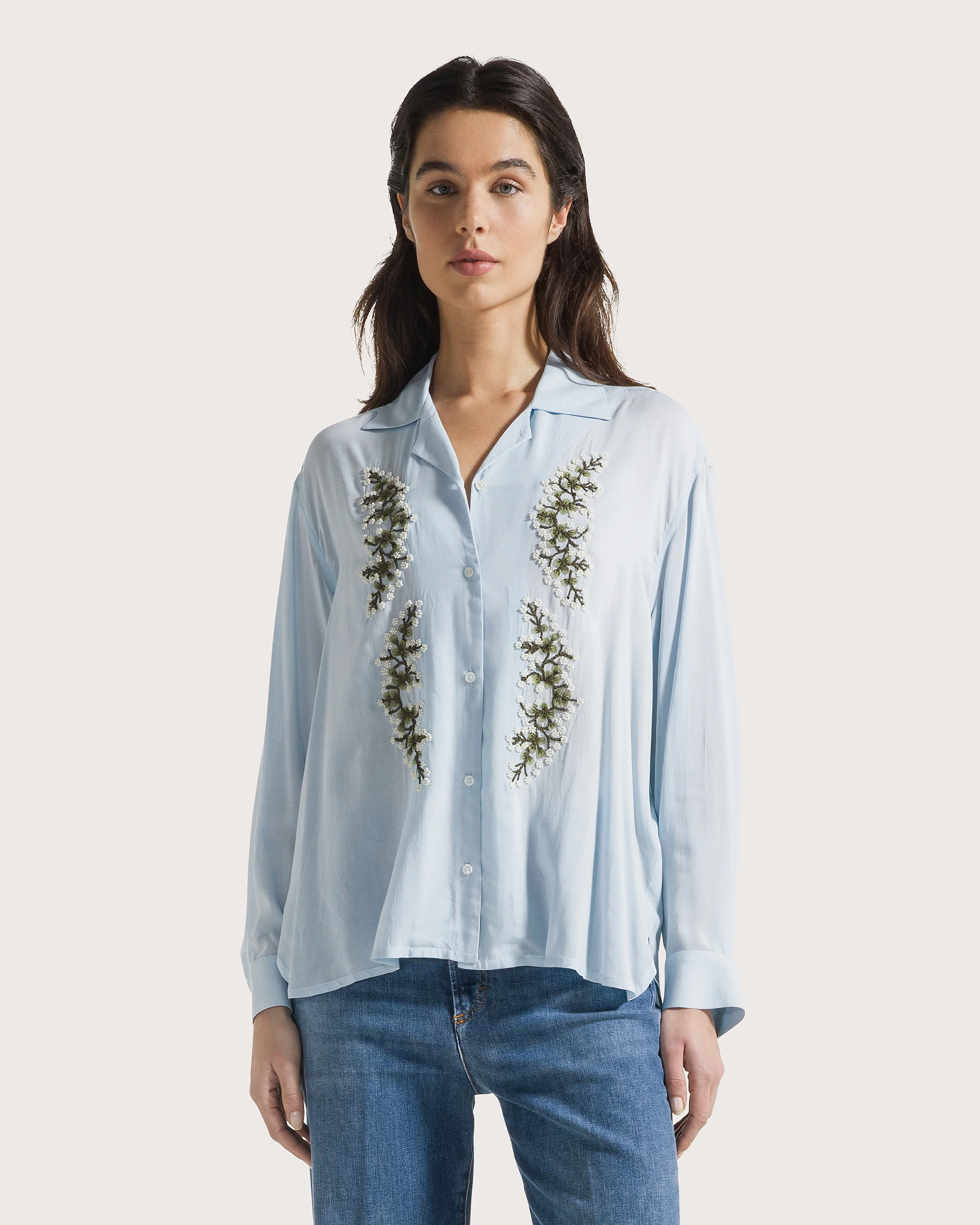 Blúza azurro tela viscosa unita a mano fiori piazzati